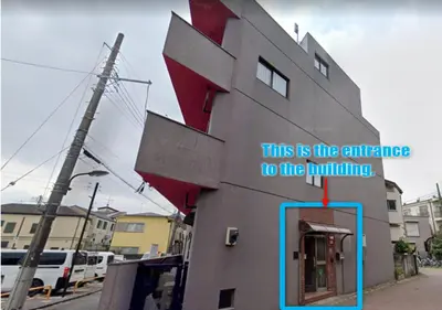 a building with a sign that says this is the entrance to the building at Senkawa CV House SC1 in Tokyo