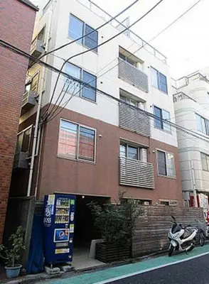 a scooter parked in front of a building at Belle Vie Waseda BW32 in Tokyo