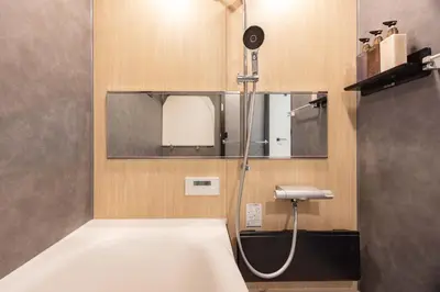 a bathroom with a shower and a sink at First Choice in Tokyo