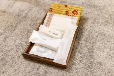 a wooden box filled with white papers on the floor at VISTALIA - Vacation STAY 18152 in Tokyo
