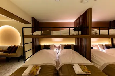 two bunk beds in a room with two beds at VISTALIA - Vacation STAY 18152 in Tokyo