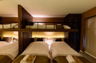 a room with three bunk beds in it at VISTALIA - Vacation STAY 18152 in Tokyo