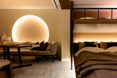 a room with a bed and a table with a lamp at VISTALIA - Vacation STAY 18153 in Tokyo