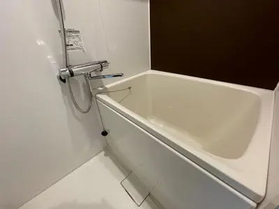 a white bath tub in a bathroom with at COMMA HOUSE Shinjuku 2UNITS 2122 in Tokyo