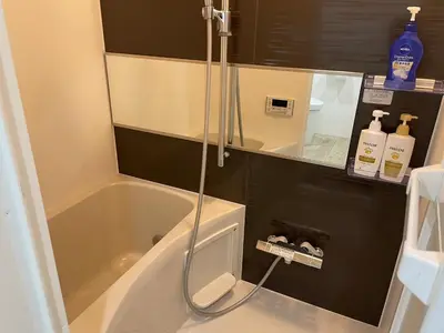 a bathroom with a shower and a bath tub at HW HILLS Komagome 401 by Tranova in Tokyo