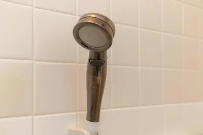 a hair dryer in a holder in a bathroom at Tokyo Kitasen 4 in Tokyo