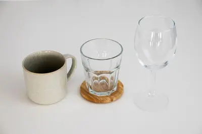 a cup and a glass and a wine glass at GIVE Meidaimae in Tokyo