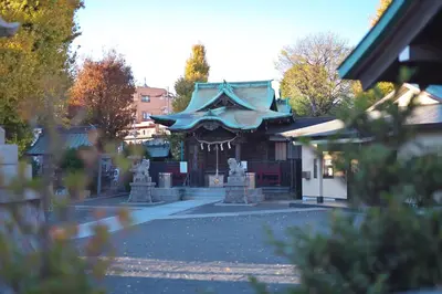 a building with a statue in the middle of a street at ZenAbode303 \u7fbd\u7530\u7a7a\u6e2f\u96fb\u8eca8\u5206 \u90fd\u5fc3\u30a8\u30ea\u30a2\u96fb\u8eca12\u5206 in Tokyo