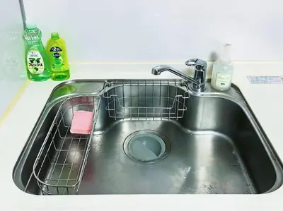 a kitchen sink with a dish rack in it at Easily to Ikebukuro Asakusa Shibuya for 5 in Tokyo