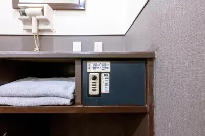 a bathroom with a pay machine in a room at Hotel Grand Fort - Vacation STAY 85406v in Tokyo