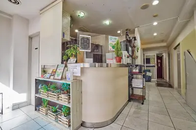 a restaurant lobby with a counter with plants at Hotel Grand Fort - Vacation STAY 85501v in Tokyo