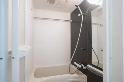 a bathroom with a shower with a sink and a toilet at Jeunesse\u7acb\u82b1 in Tokyo