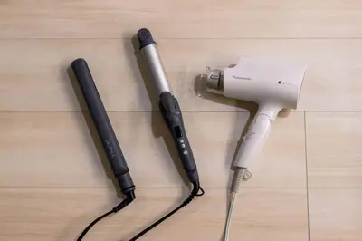 two hair dryers sitting on top of a wooden floor at Origami-ya Stay Zen - Luxury Asakusa Penthouse in Tokyo