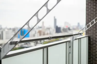 an open balcony with a view of a city at Origami-ya Stay Akari - Luxury Asakusa Penthouse in Tokyo