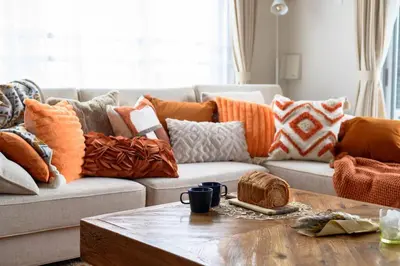a living room with a couch with pillows on it at Origami-ya Stay Akari - Luxury Asakusa Penthouse in Tokyo