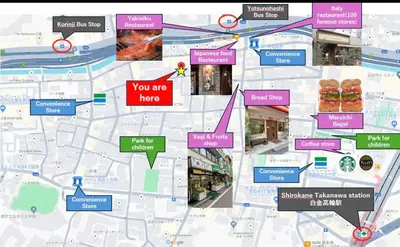 a map of a city with signs that say you are here at Shirokane Apartment Hotel 3 in Tokyo