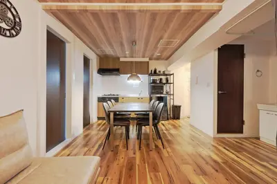 a dining room and living room with a table and chairs at V Close to Shinjuku Kabukicho Korean Town FrWIFI K in Tokyo