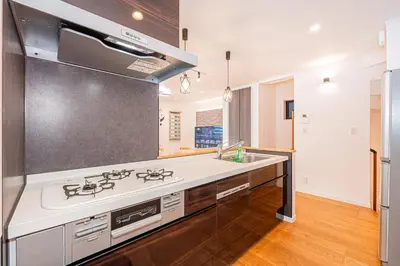 a kitchen with a sink and a stove at Arashi hotel \u5d50\u30db\u30c6\u30eb in Tokyo