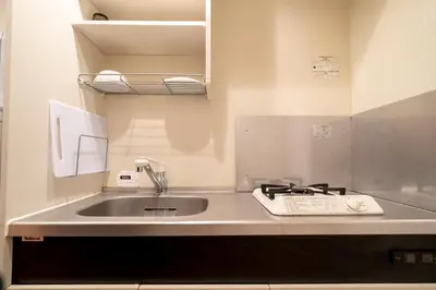 a kitchen with a sink and a counter top at Belle Lead 105 in Tokyo