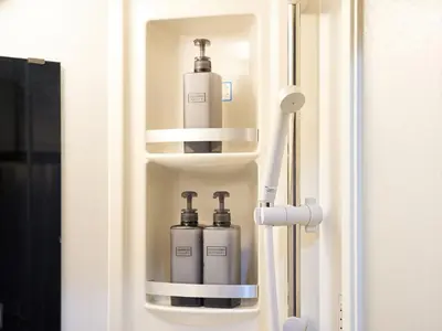 a bathroom door with two soap dispensers in it at Shinbashi Hotel Sho - Vacation STAY 82917v in Tokyo