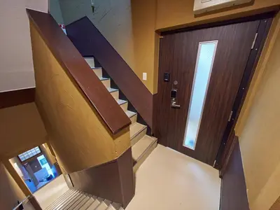 an overhead view of a stairway with a door at Shinbashi Hotel Sho - Vacation STAY 82917v in Tokyo