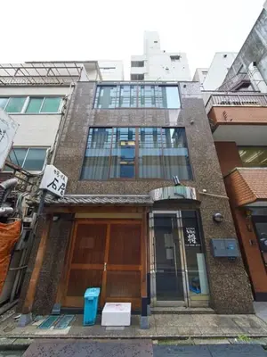 a building with a sign in front of it at Shinbashi Hotel Sho - Vacation STAY 82917v in Tokyo