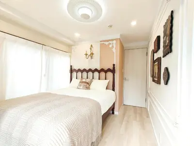 a bedroom with a bed and a window at ds' 2ROOMS NEW APT Max 6P 临近商业街 2室1厅1卫生间 交通便利 最大6人 Max 6P 方便到达新宿 涉谷 表参道 池袋 in Tokyo