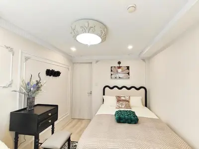 a bedroom with a bed and a desk and a chair at ds' 2ROOMS NEW APT Max 6P 临近商业街 2室1厅1卫生间 交通便利 最大6人 Max 6P 方便到达新宿 涉谷 表参道 池袋 in Tokyo