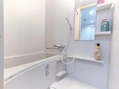 a white bathroom with a sink and a mirror at ds' 2ROOMS NEW APT Max 6P 临近商业街 2室1厅1卫生间 交通便利 最大6人 Max 6P 方便到达新宿 涉谷 表参道 池袋 in Tokyo