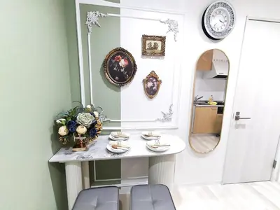 a room with a table with plates and a mirror at ds' 2ROOMS NEW APT Max 6P 临近商业街 2室1厅1卫生间 交通便利 最大6人 Max 6P 方便到达新宿 涉谷 表参道 池袋 in Tokyo