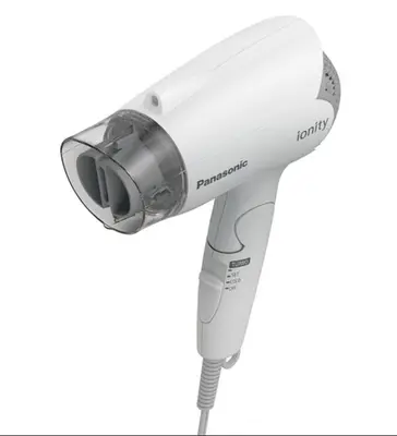 a white hair dryer on a white background at japan house Otsuka in Tokyo