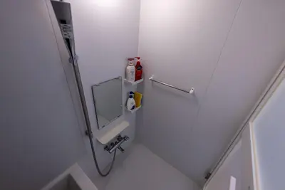 a small bathroom with a mirror and a sink at YIYou Japan\u79cb\u8449\u539f302 in Tokyo