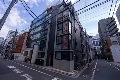 a building on the side of a city street at YIYou Japan\u79cb\u8449\u539f302 in Tokyo