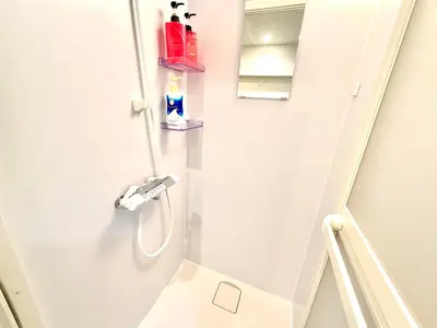 a white bathroom with a sink and a toilet at Shinjuku city4\u4eba\u53efTV\u4ed8\u304d in Tokyo