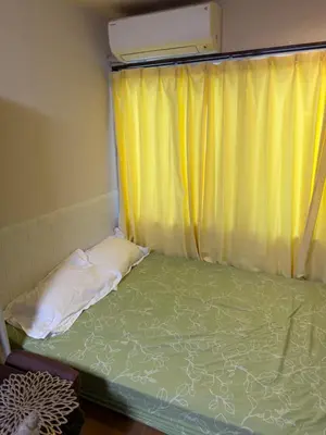 a small bed in a room with a window at \u7ae5\u7ae5\u6c11\u5bbf in Tokyo