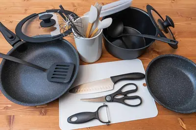 a table with some utensils and pans and scissors at \u30bb\u30f3\u30c8\u30e9\u30eb\u30d5\u30a3\u30fc\u30eb\u30c9 in Tokyo