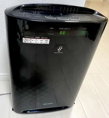 a laptop computer sitting on top of a floor at TOKYO SPA Premier UENO in Tokyo