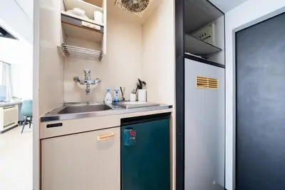 a small kitchen with a sink and a sinkiterator at SAKURA Residence\u76ee\u9ed2 307 in Tokyo
