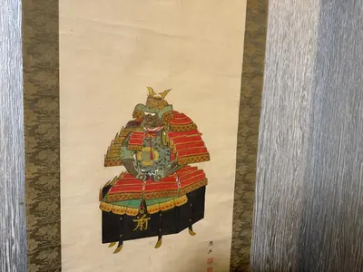 a painting of a demon on a table at Shiba inn in Tokyo