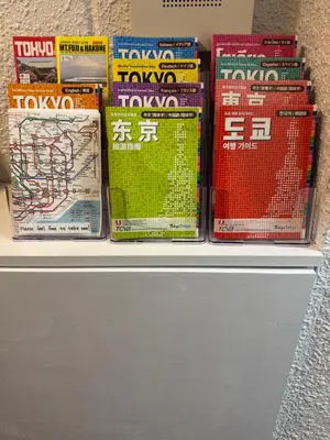 a display of books on a shelf at Shiba inn in Tokyo