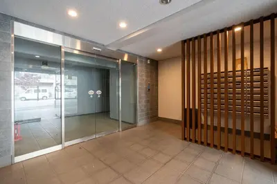 a hallway with a glass door in a building at Access\u6587\u4eac\u5927\u585a in Tokyo