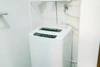 a washing machine in a bathroom with a shower at YY-Minamicho 1 room-IT0339 in Tokyo