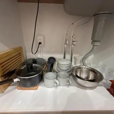 a kitchen counter with pots and pans and a sink at YY-Minamicho 1 room-IT0339 in Tokyo