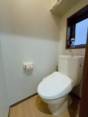 a white toilet in a bathroom with a window at YY-Minamicho 1 room-IT0339 in Tokyo