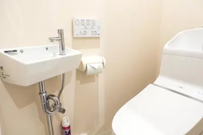 a bathroom with a sink and a toilet at Avinity Higashi Nakano 1F - Vacation STAY 87308v in Tokyo