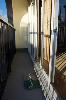 a pair of slippers on the floor of a balcony at \u5168\u65b0\u88c5\u4fee\u5357\u54c1\u5dddHaven\u67091\u95f4\u548c\u5ba4\u51712\u5367\u5ba4 in Tokyo