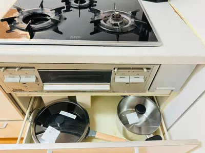 a stove top oven sitting inside of a cabinet at PUSU-OKUBO House 3LDK-SJ0079 in Tokyo