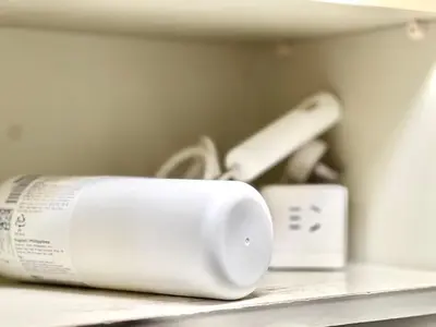 a white object on a shelf with other appliances at Top Ikebukuro 301 -TS0034 in Tokyo