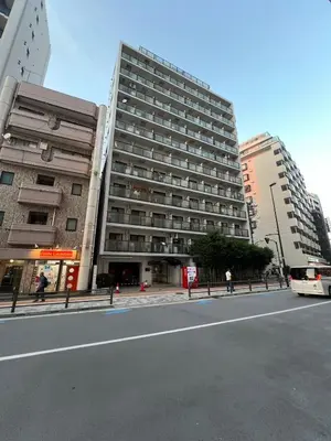 a large building on the side of a city street at Top Ikebukuro 301 -TS0034 in Tokyo