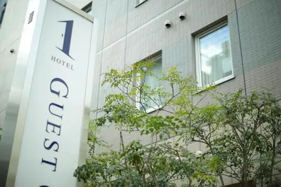 a sign for a hotel outside of a building at HOTEL Guest1 Ueno Ekimae in Tokyo